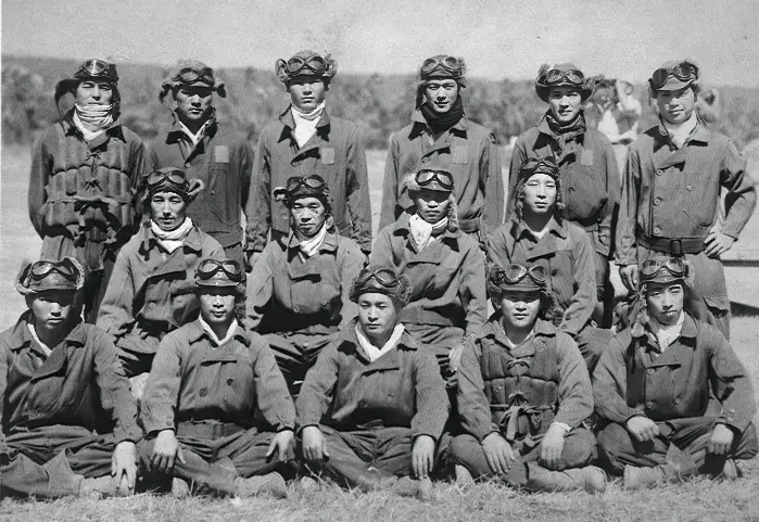 Enlisted pilots of the Tainan Kokutai pose at Lae in June 1942. Several of these aviators would be among the top Japanese aces, including Toshio Ōta (middle row, far left), Saburo Sakai (seated next to Ōta, second from the left) and Hiroyoshi Nishizawa (standing to the far left). These pilots fought against Allied fighter pilots during the Battle of Guadalcanal and the Solomon Islands campaign