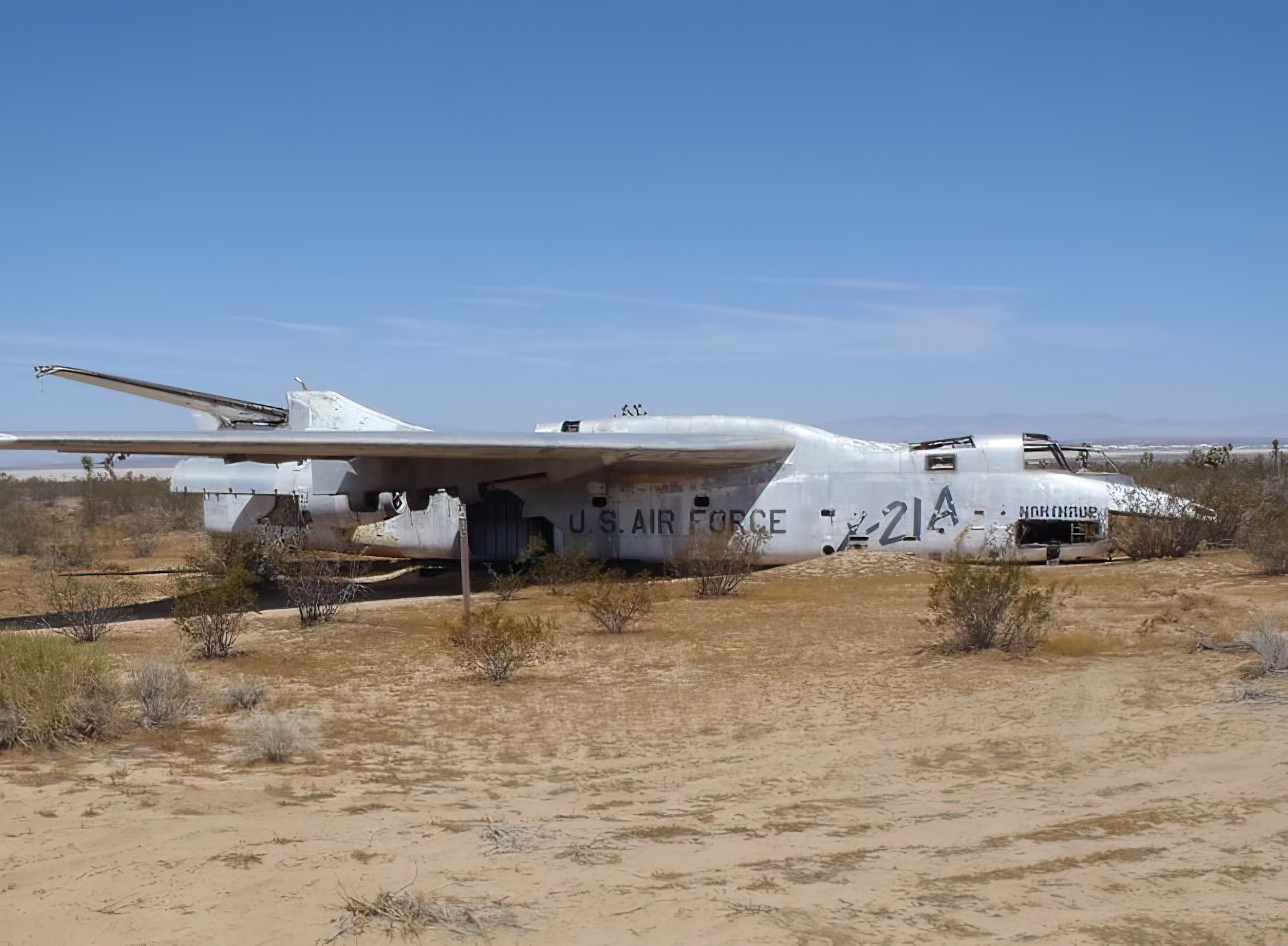 One of the X-21s in its current, derelict state. Note the folded vertical stabilizer, a feature developed for the carrier-borne A-3 Skywarrior from which the X-21 and the B-66 are derived. [Credit: Air Force Flight Test Museum]